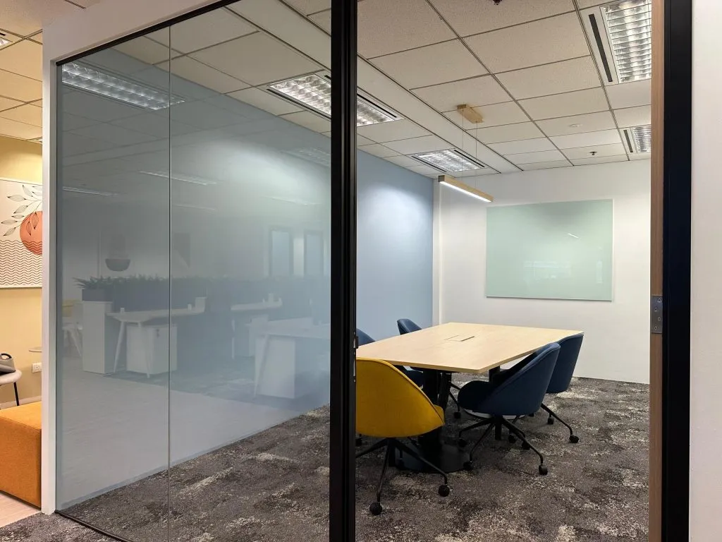 Completed glass-walled meeting room ready for handover