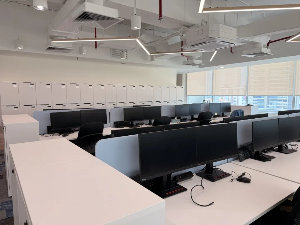 A CTN design and build workplace with exposed services and rows of workstations